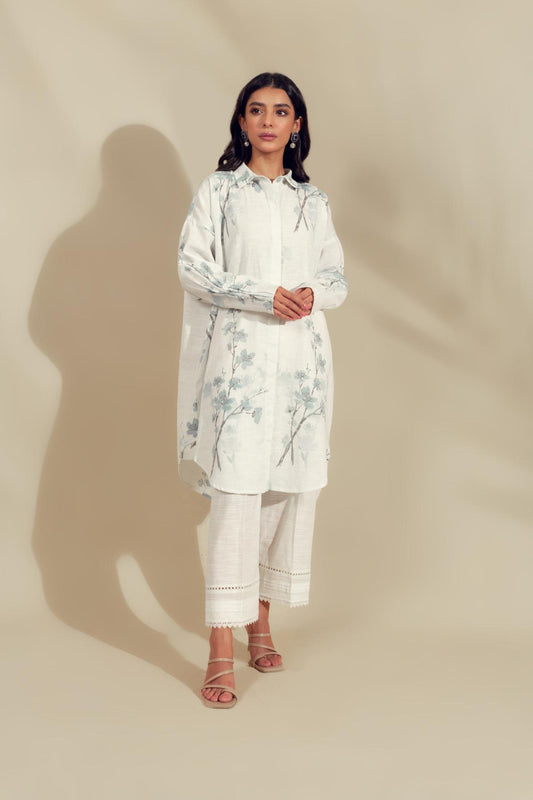 Standing Model wearing Azure a printed cotton  shirt 