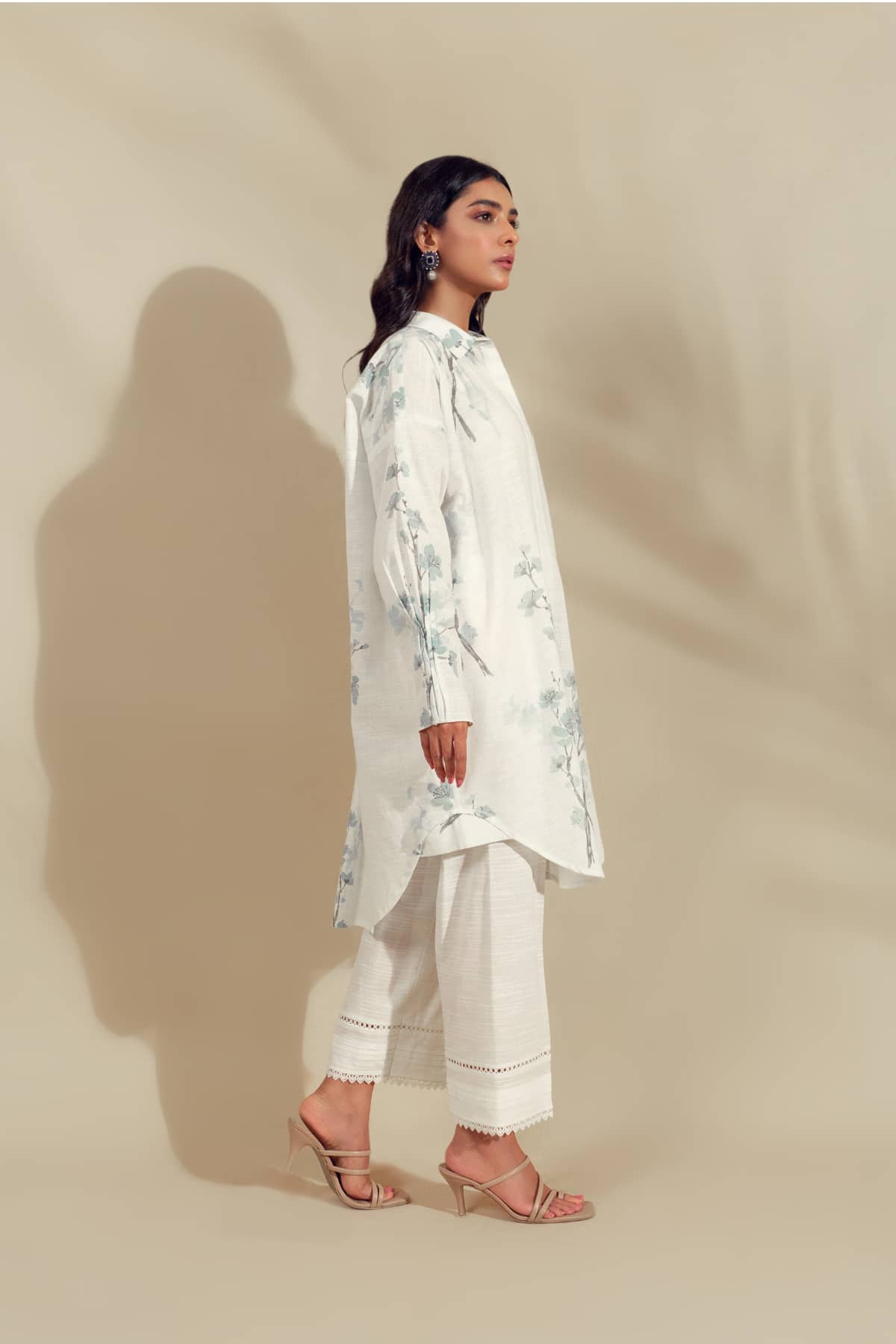 Standing Model wearing Azure a printed cotton  shirt 